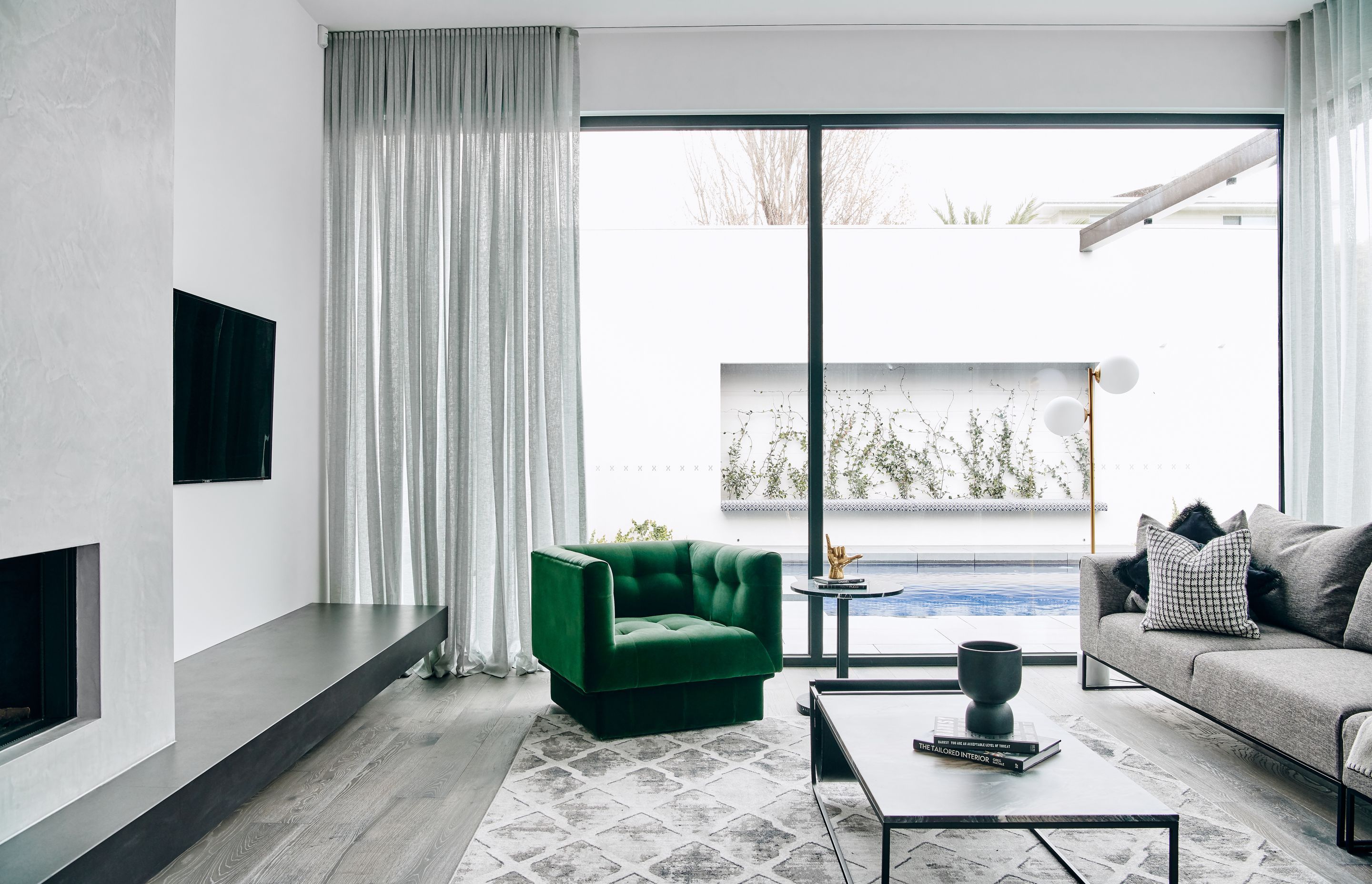 Twostyle transformed this property in Sorrento, VIC, including a T&amp;W rug and lamp.