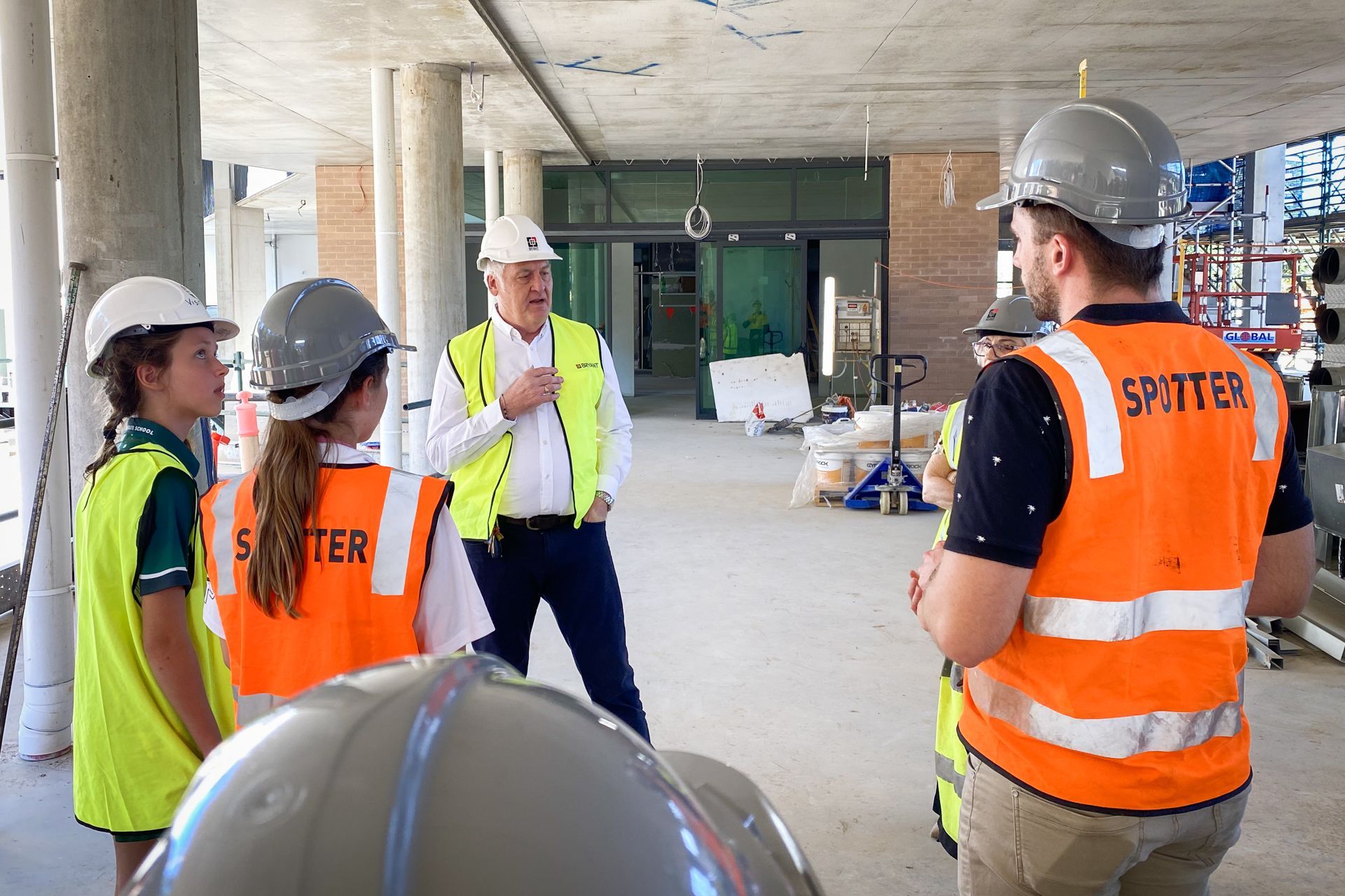 Director Roger Mainwood taking a group on a tour of the building