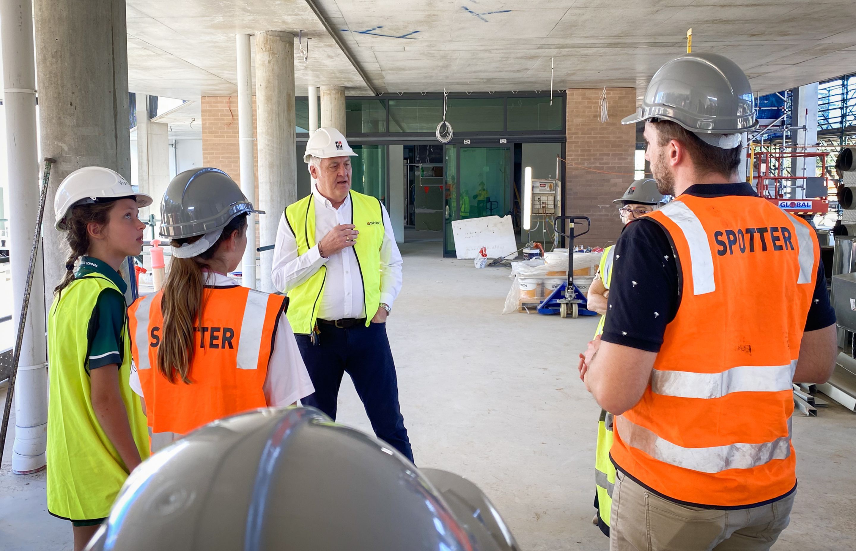 Director Roger Mainwood taking a group on a tour of the building