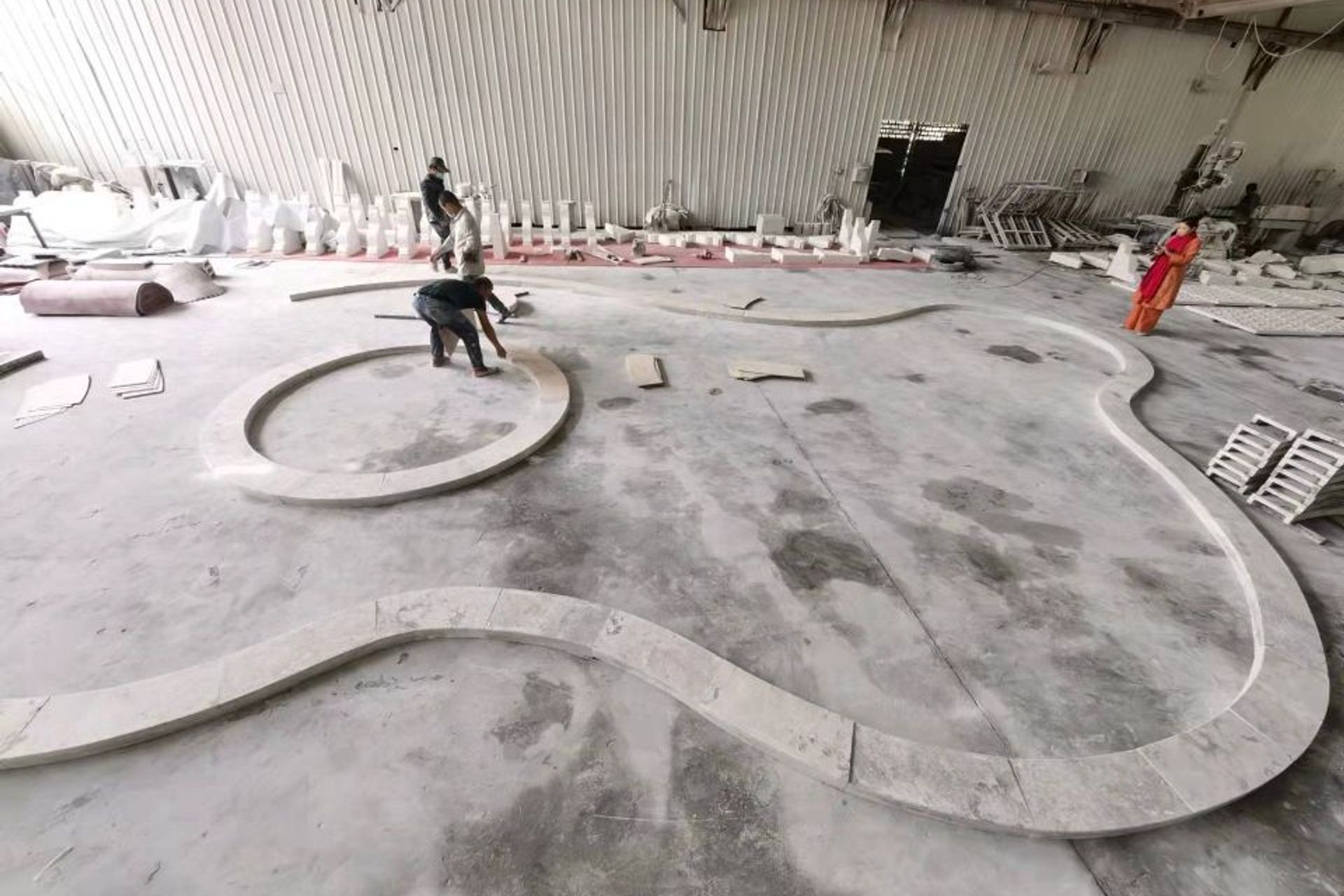 The factory lays out the coping out according to the templates to make sure it all fits seamlessly.