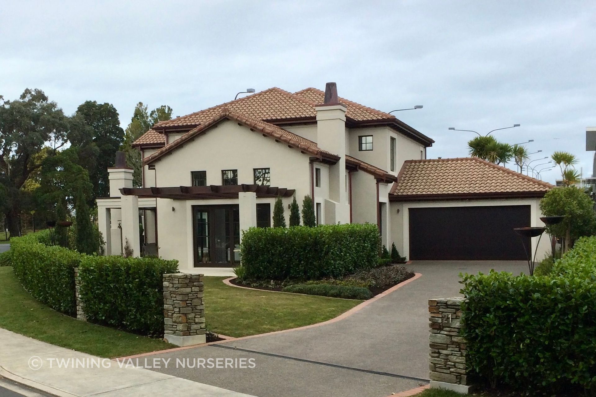 Installed together, the hedge units define the property and frame the entrance from day one.