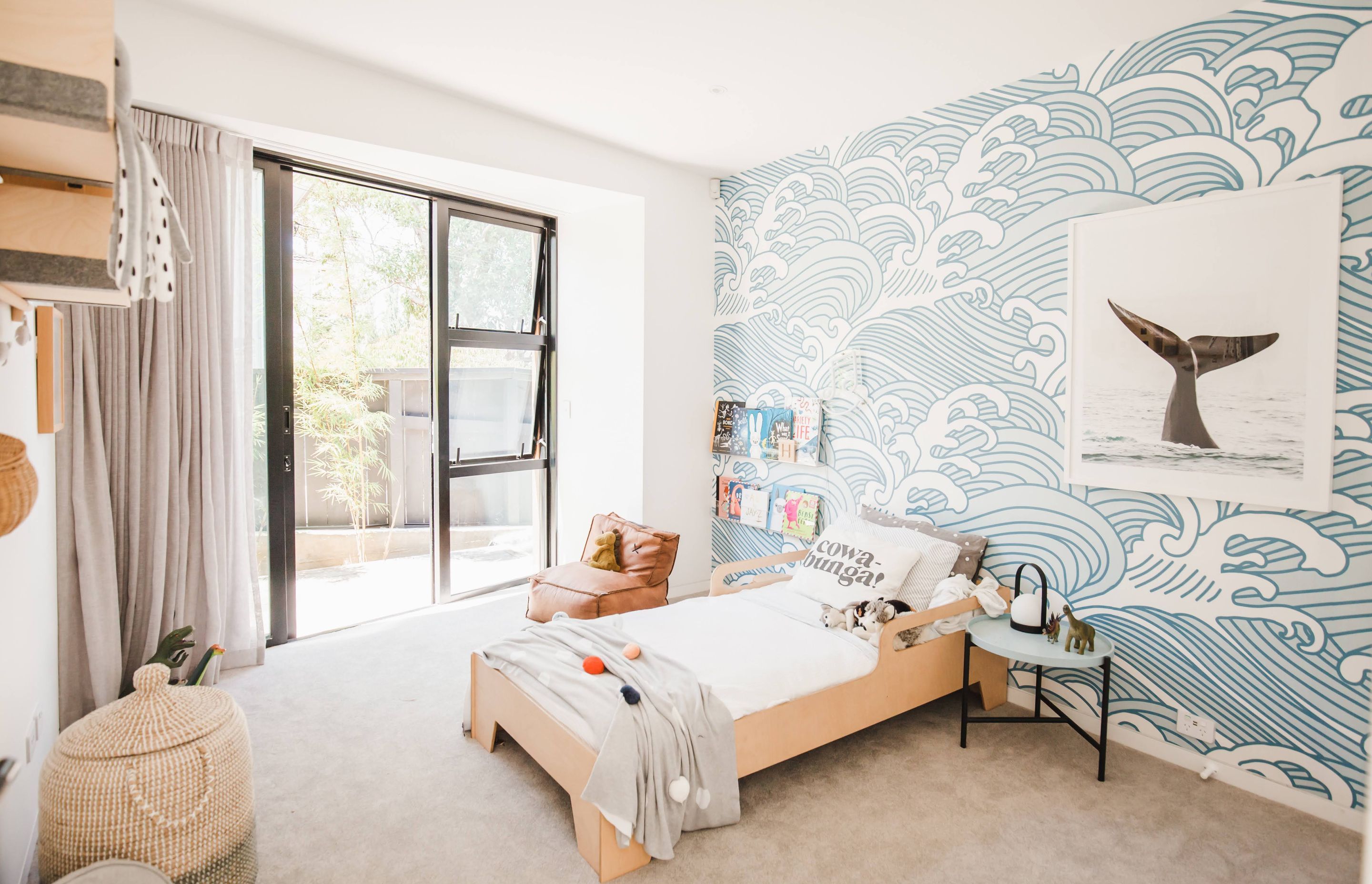 Ocean-themed wallpaper and the Plyhome Junior Bed by Plyhome are a perfect combination in the youngest son's bedroom.