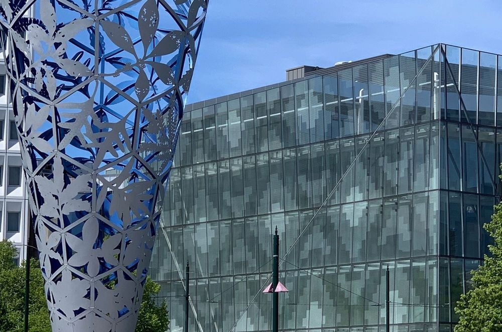 The transparent and open nature of the building creates a better connection between the Square and the retail and hospitality areas. Courtesy of Sheppard & Rout Architects.