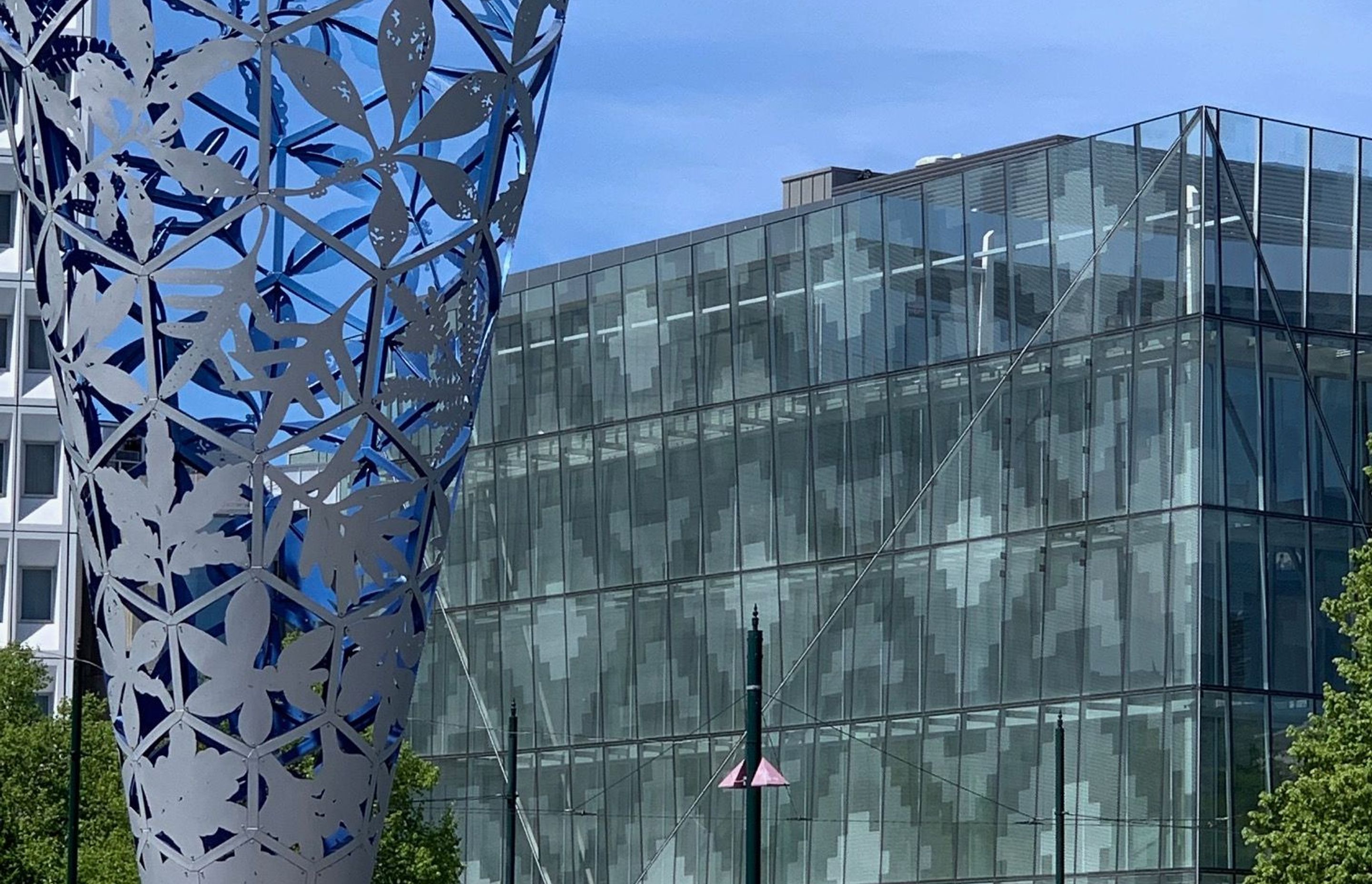 The transparent and open nature of the building creates a better connection between the Square and the retail and hospitality areas. Courtesy of Sheppard & Rout Architects.