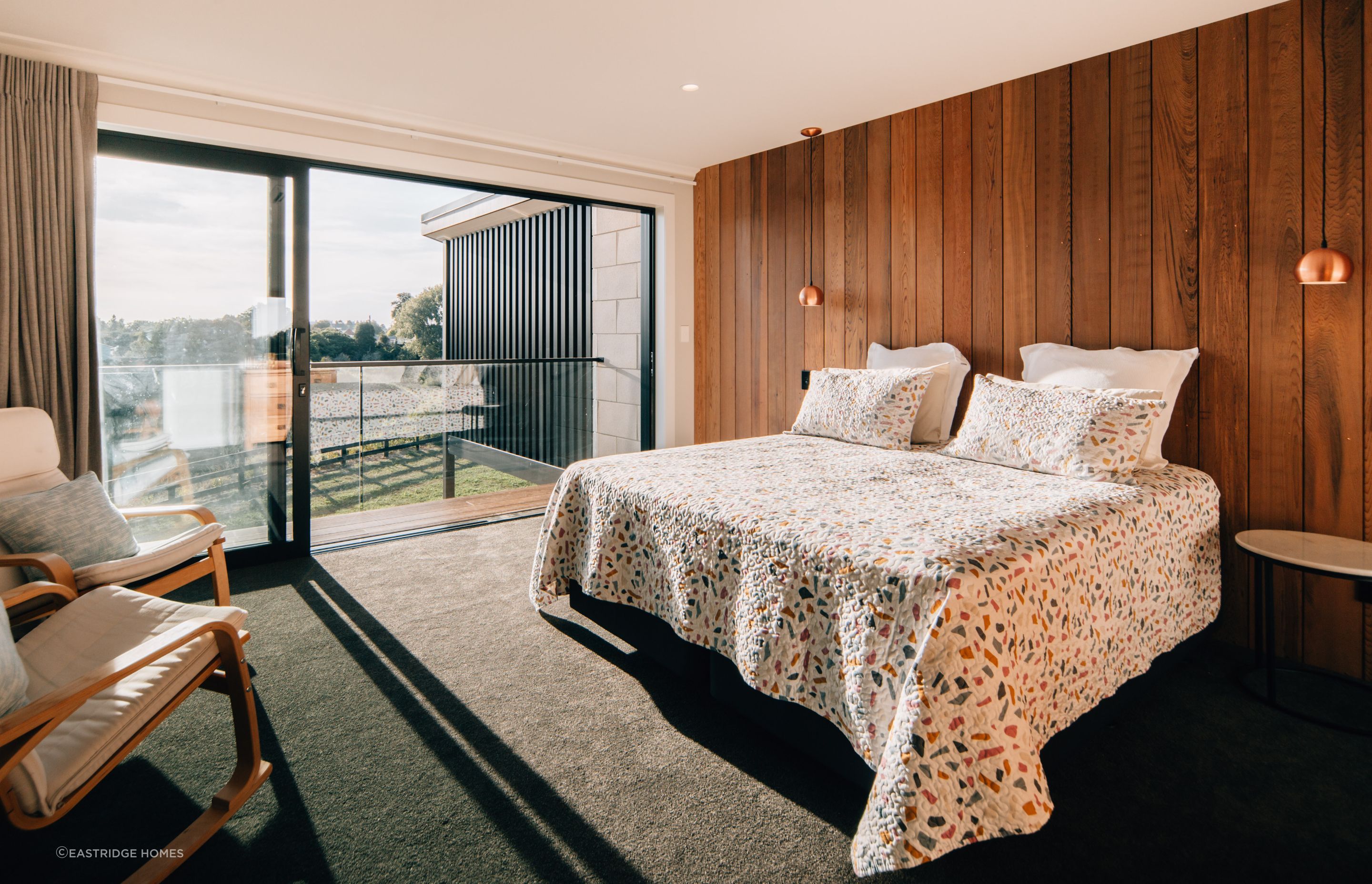 The master bedroom has its own balcony with beautiful views over the city