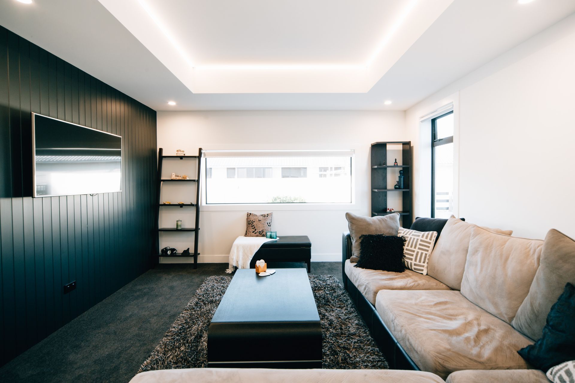 The media room is the perfect space to keep all members of the family entertained