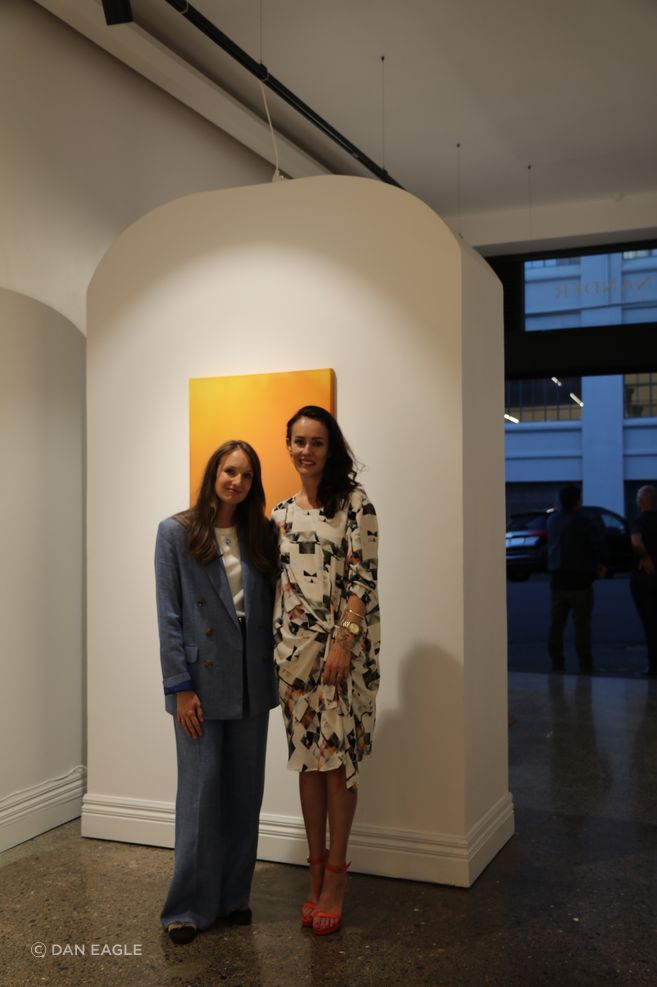 Artwork by Kate Serebrianskaia (artist pictured with co-curator Emma Eagle of Good Form) Something to believe in, 2026. Acrylic fluid and ink on canvas.