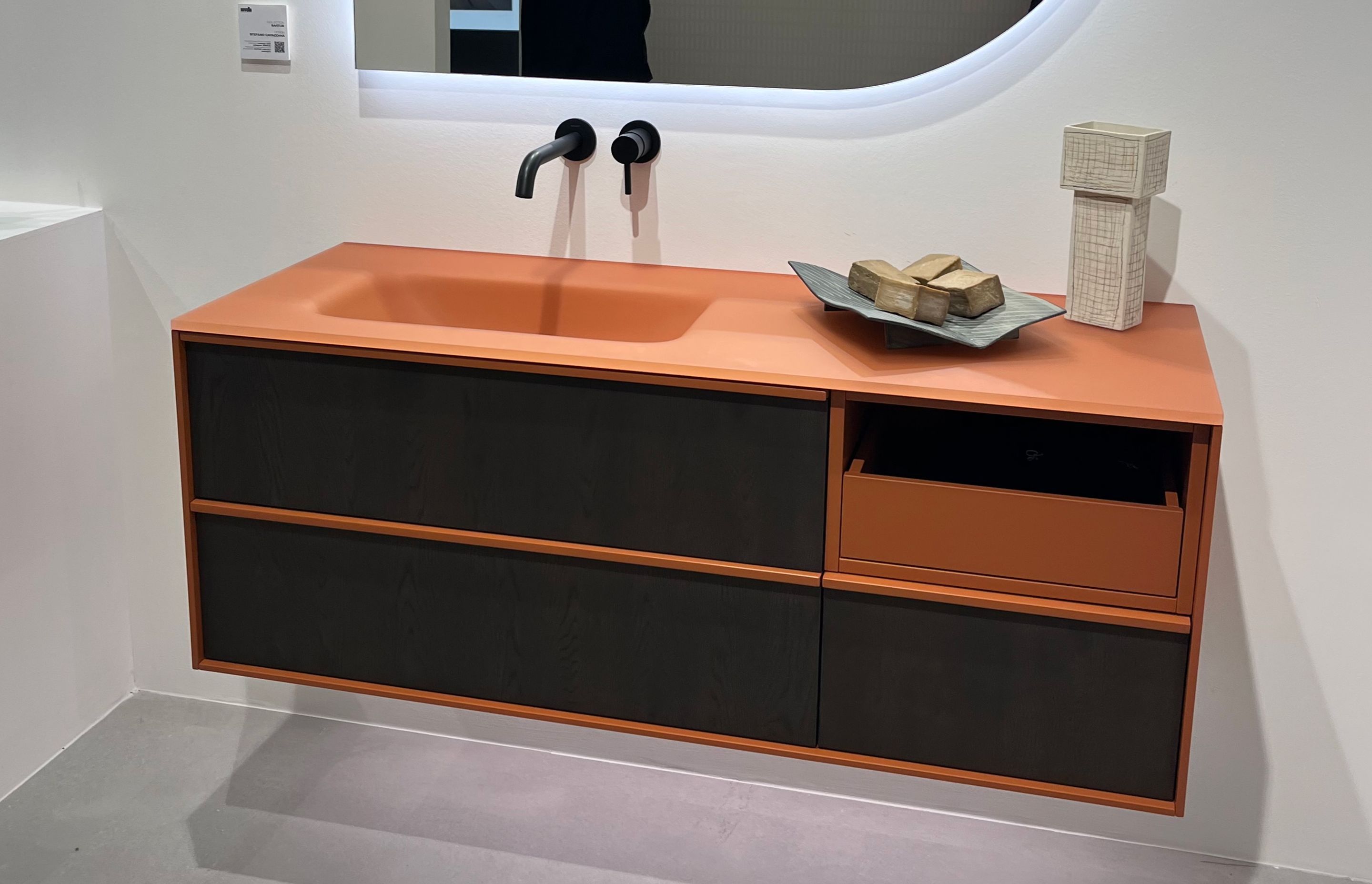 Matte finishes and bold colour palettes combine on this bathroom vanity seen at ISH.