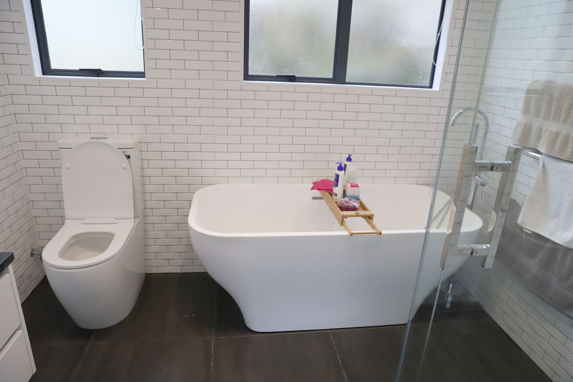 A smaller freestanding bathtub installed in this Ellerslie bathroom renovation