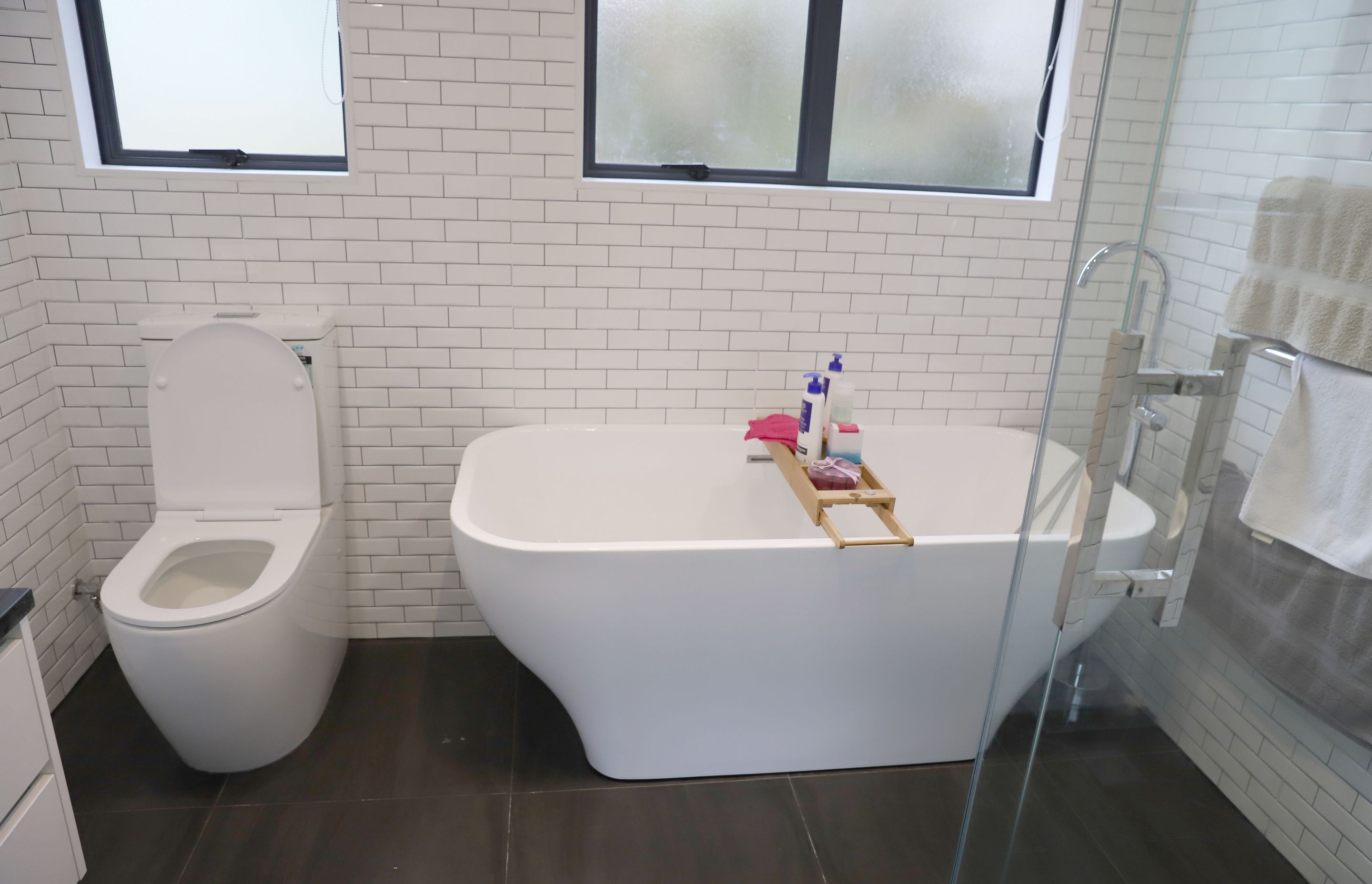 A smaller freestanding bathtub installed in this Ellerslie bathroom renovation
