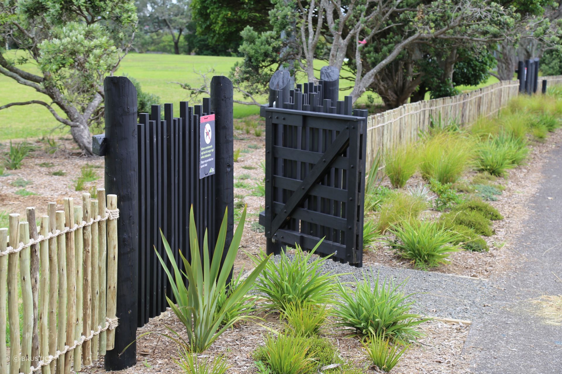 Natural Eucalypt Fencing continues from the entrance, creating a softer boundary that follows the established landscape.