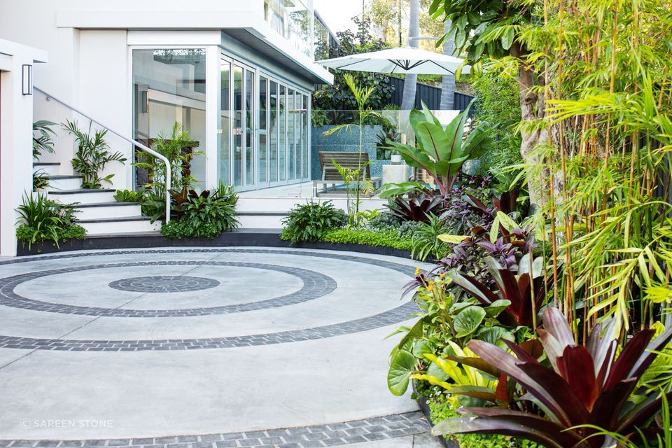 Charcoal Grey Granite Cobblestones | Landsberg Garden Design | Quercus Gardens | Tasman Building