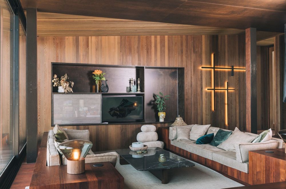 Custom steel cabinetry is a key feature of the living area.