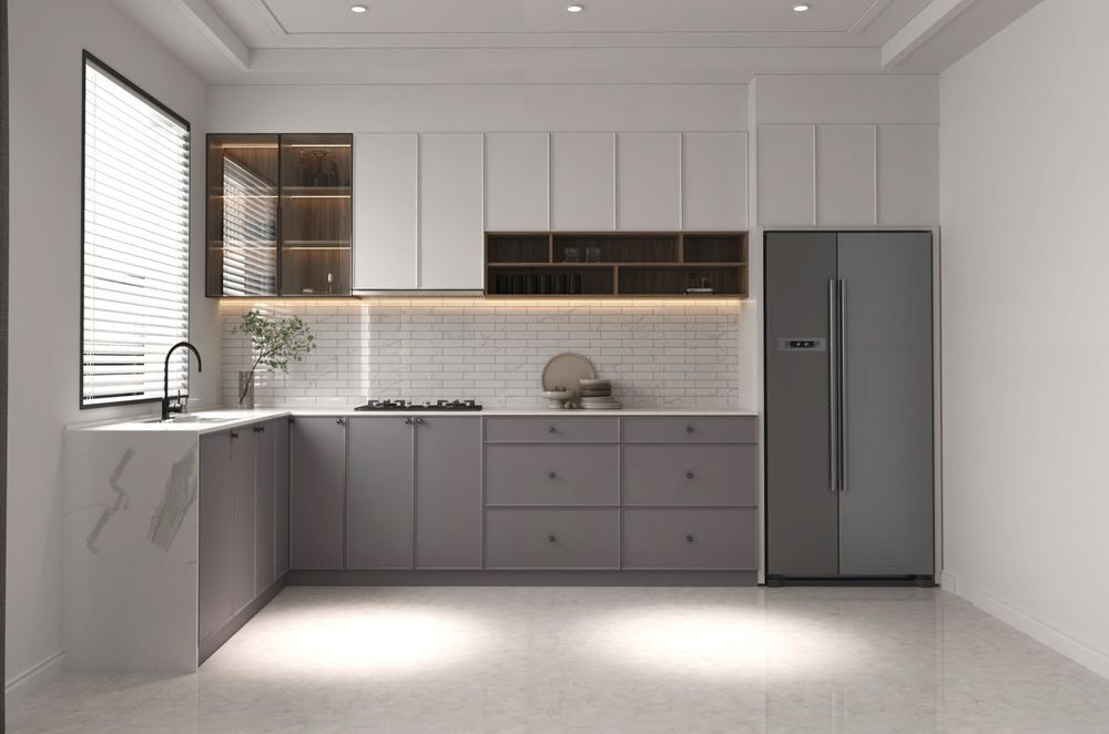 A soft kitchen design uses simple yet clever use of lighting for a warm kitchen design.