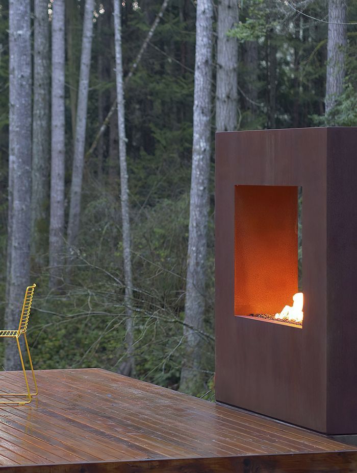  Corten steel gives this fireplace a distressed, naturally aged look