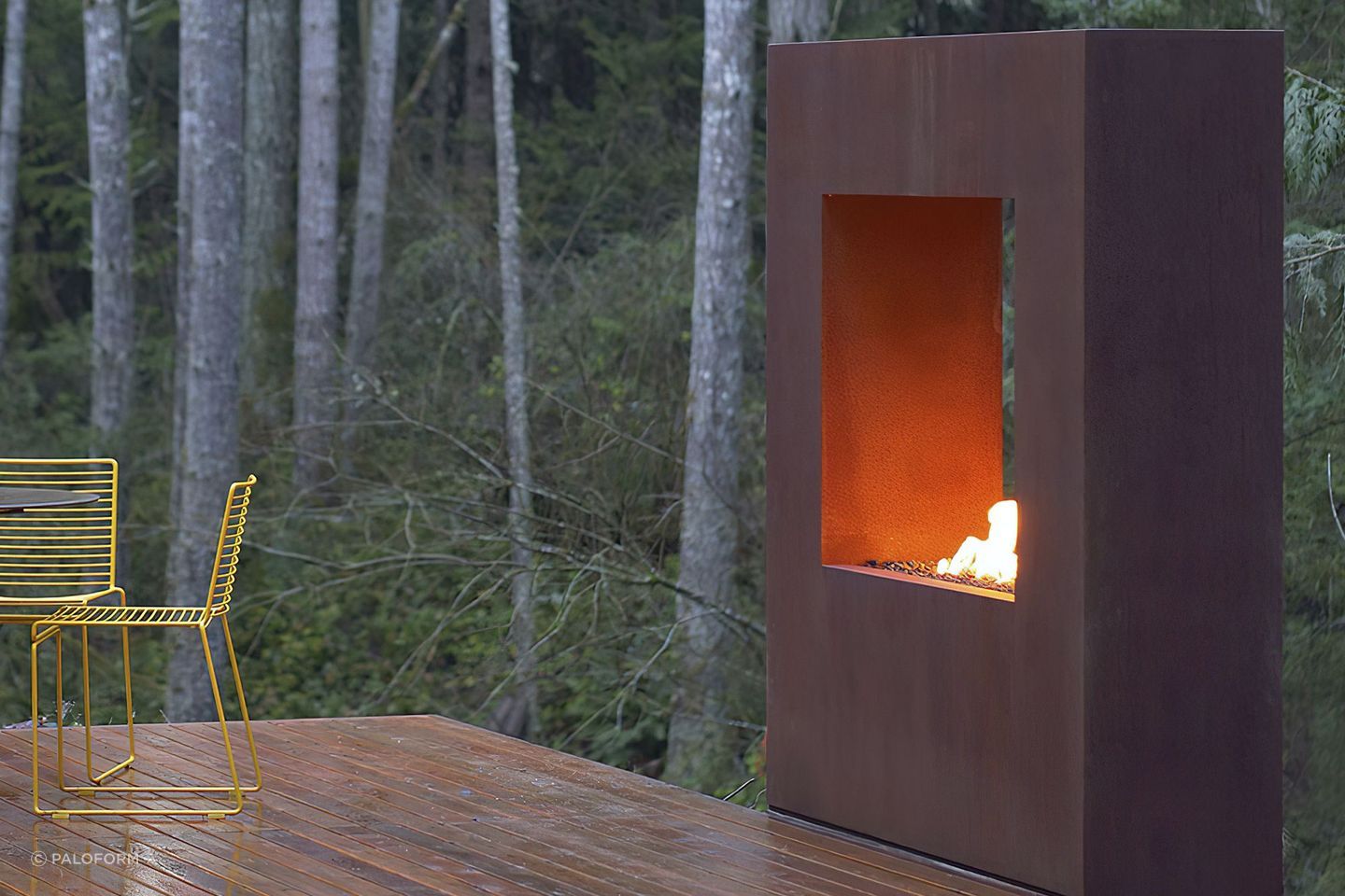 Corten steel gives this fireplace a distressed, naturally aged look