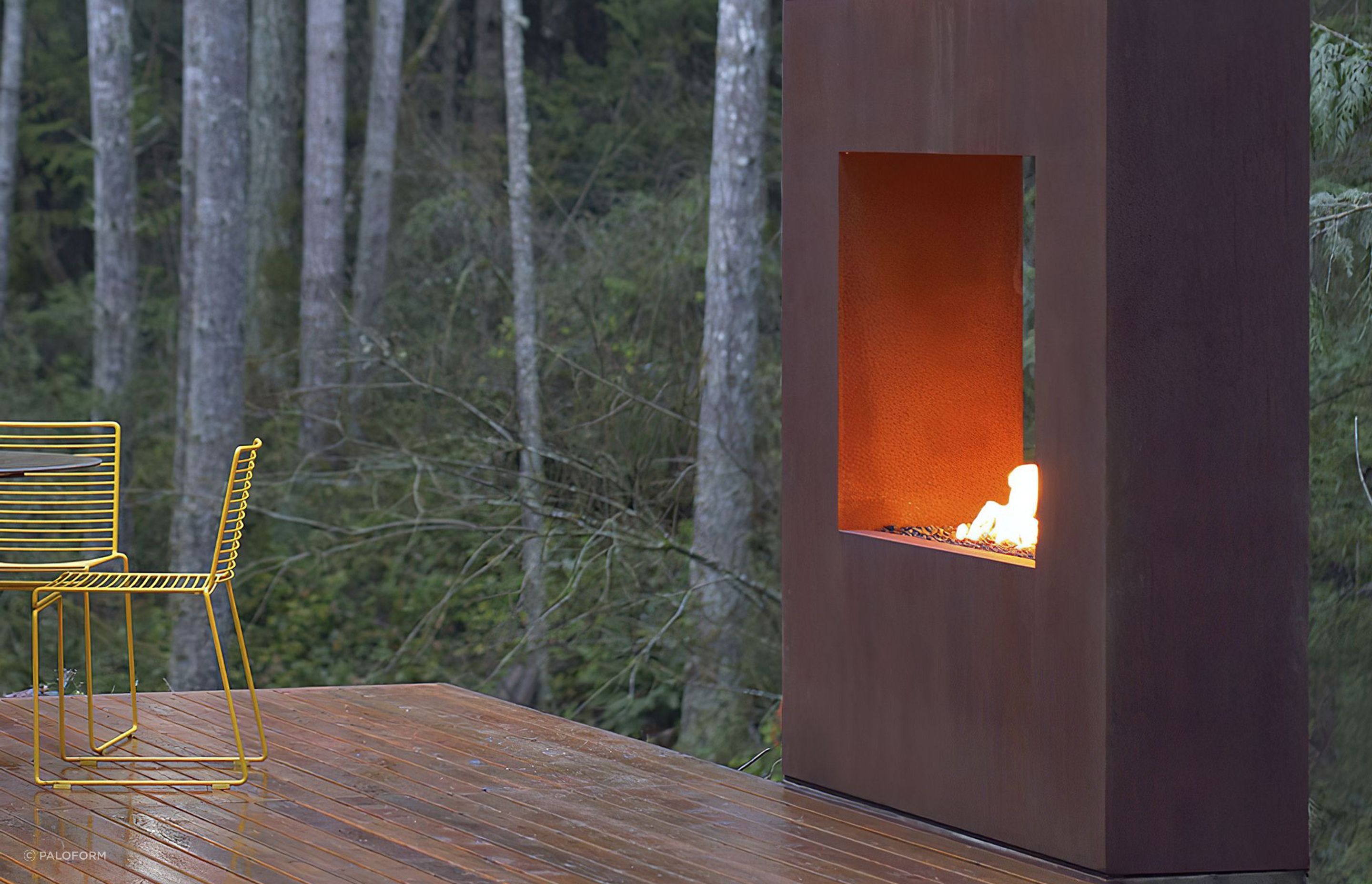 Corten steel gives this fireplace a distressed, naturally aged look