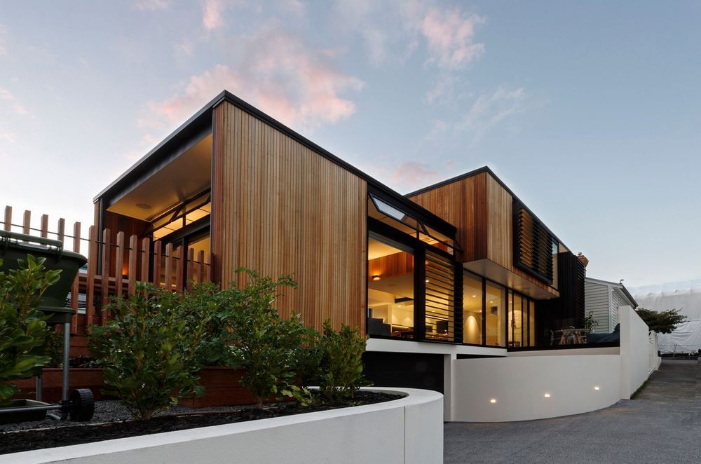 This modern home features textured wall panels along with the beautiful Kwila Handrails.