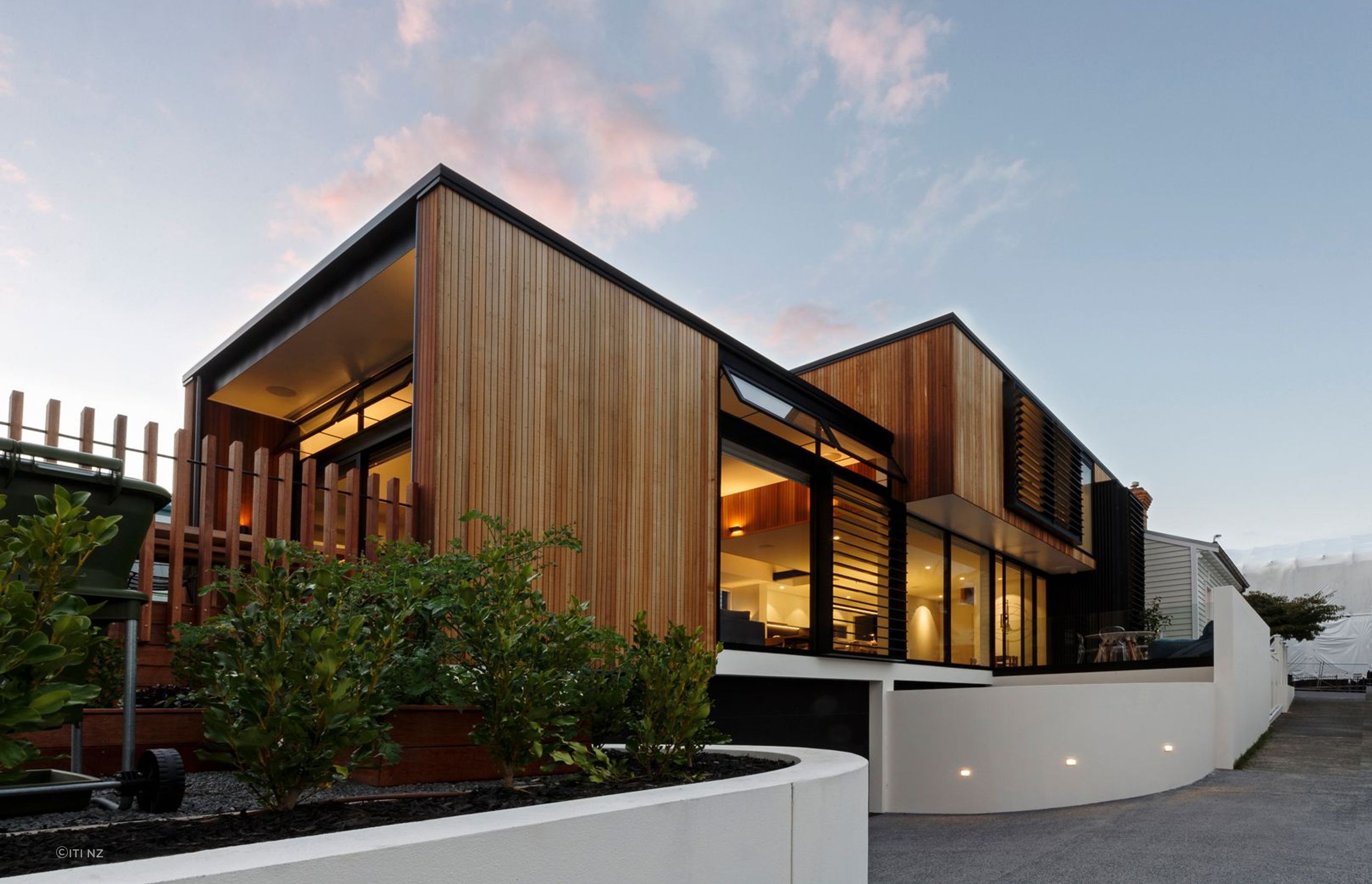 This modern home features textured wall panels along with the beautiful Kwila Handrails.