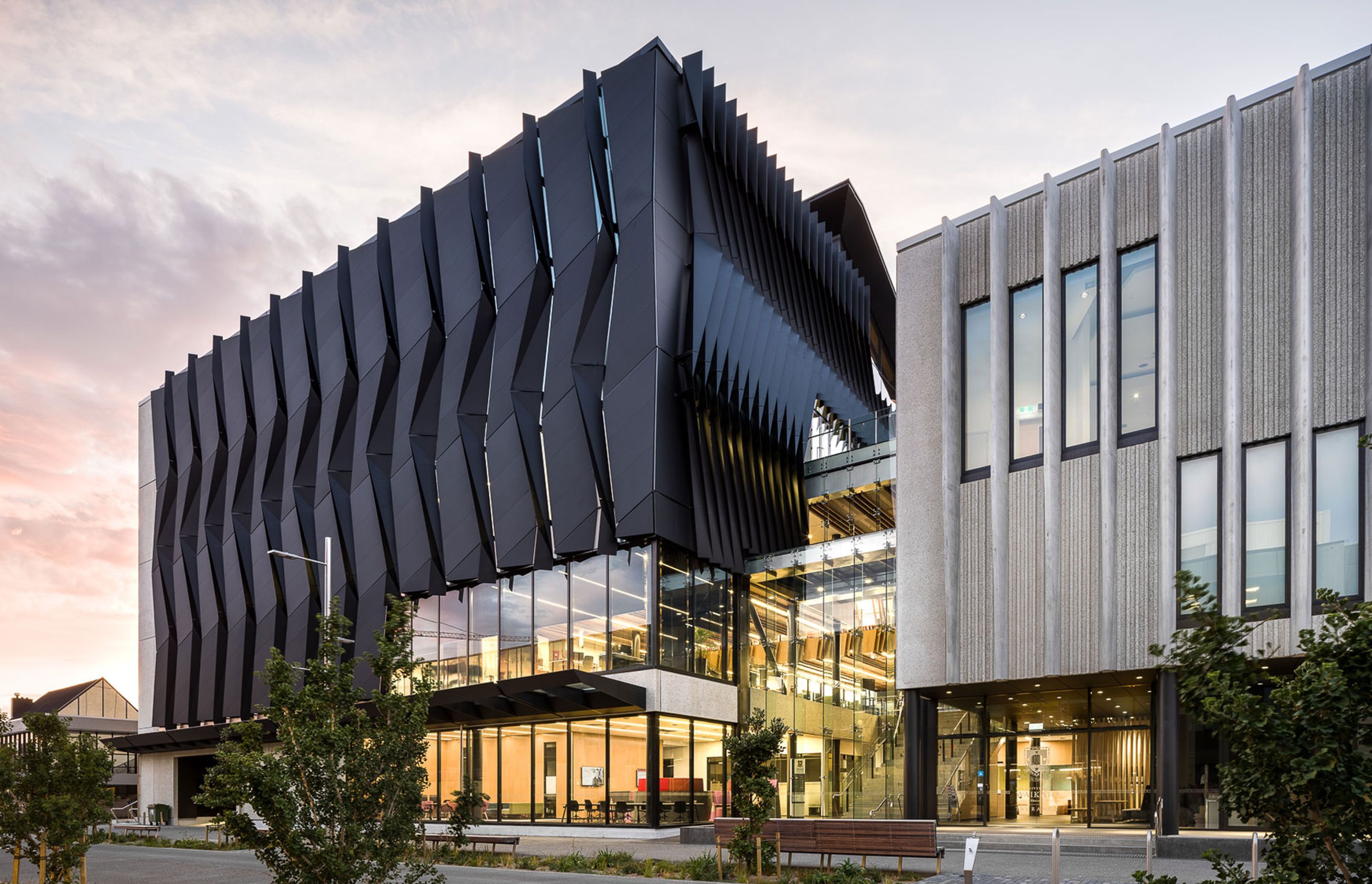 A modern façade featuring the Alucolux Solid A1 Aluminum Facade Panel.