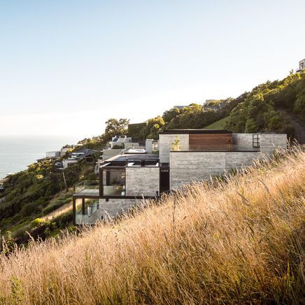 A dramatic in-situ concrete house on the side of a volcano