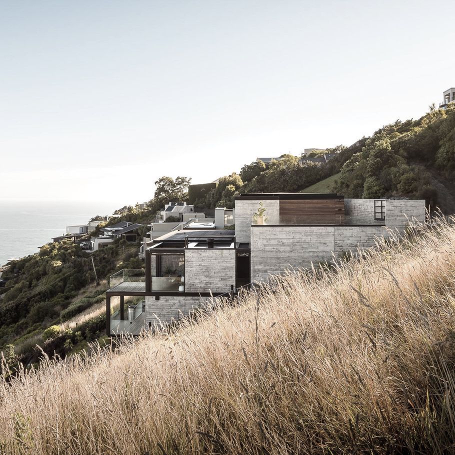 A dramatic in-situ concrete house on the side of a volcano