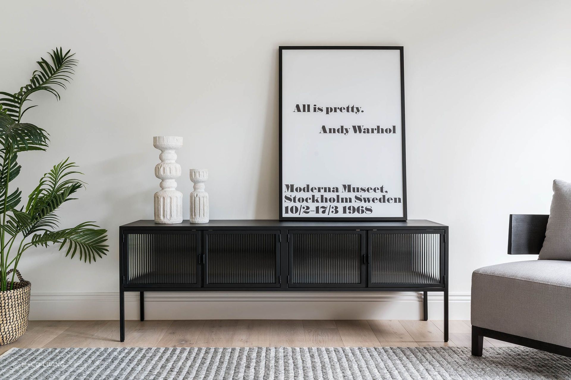 Industrial with a twist of Art Deco - the powder coated metal and glass Ambrose Entertainment Unit