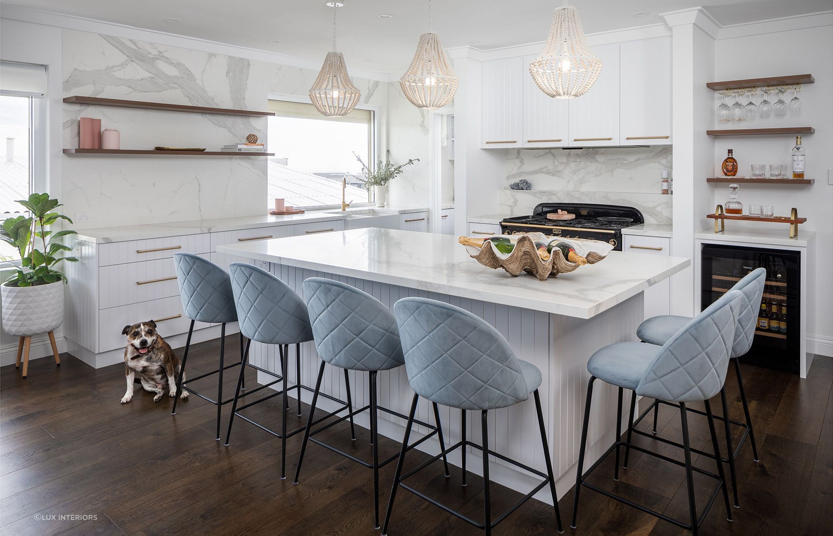 Ample storage and shelving solutions will allow you to maximise your counter space, beautifully done in this coastal barn home