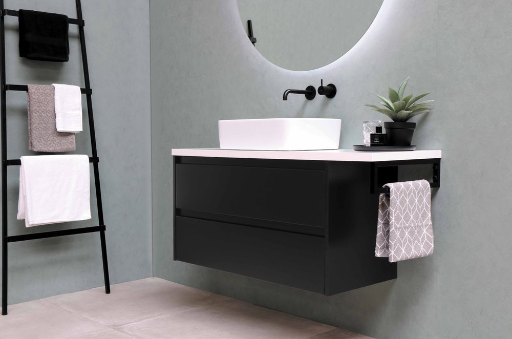 This ladder propped against the wall is a great place to hang your towels and it also makes for a great design element.