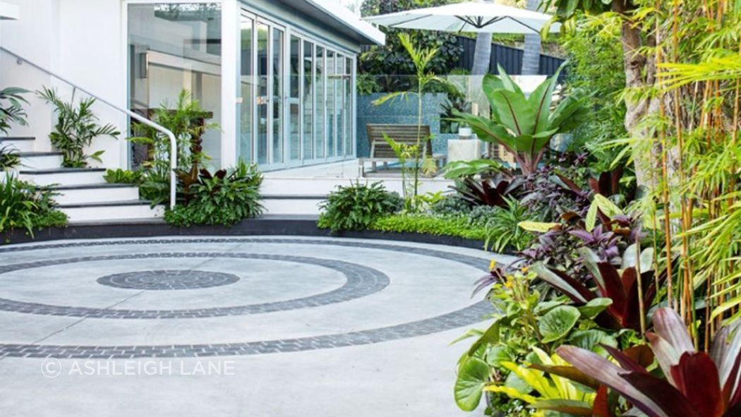 Charcoal Grey Granite Cobblestones | Landsberg Gardens | Quercus Gardens | Tasman Building | Annie Benjamin Design