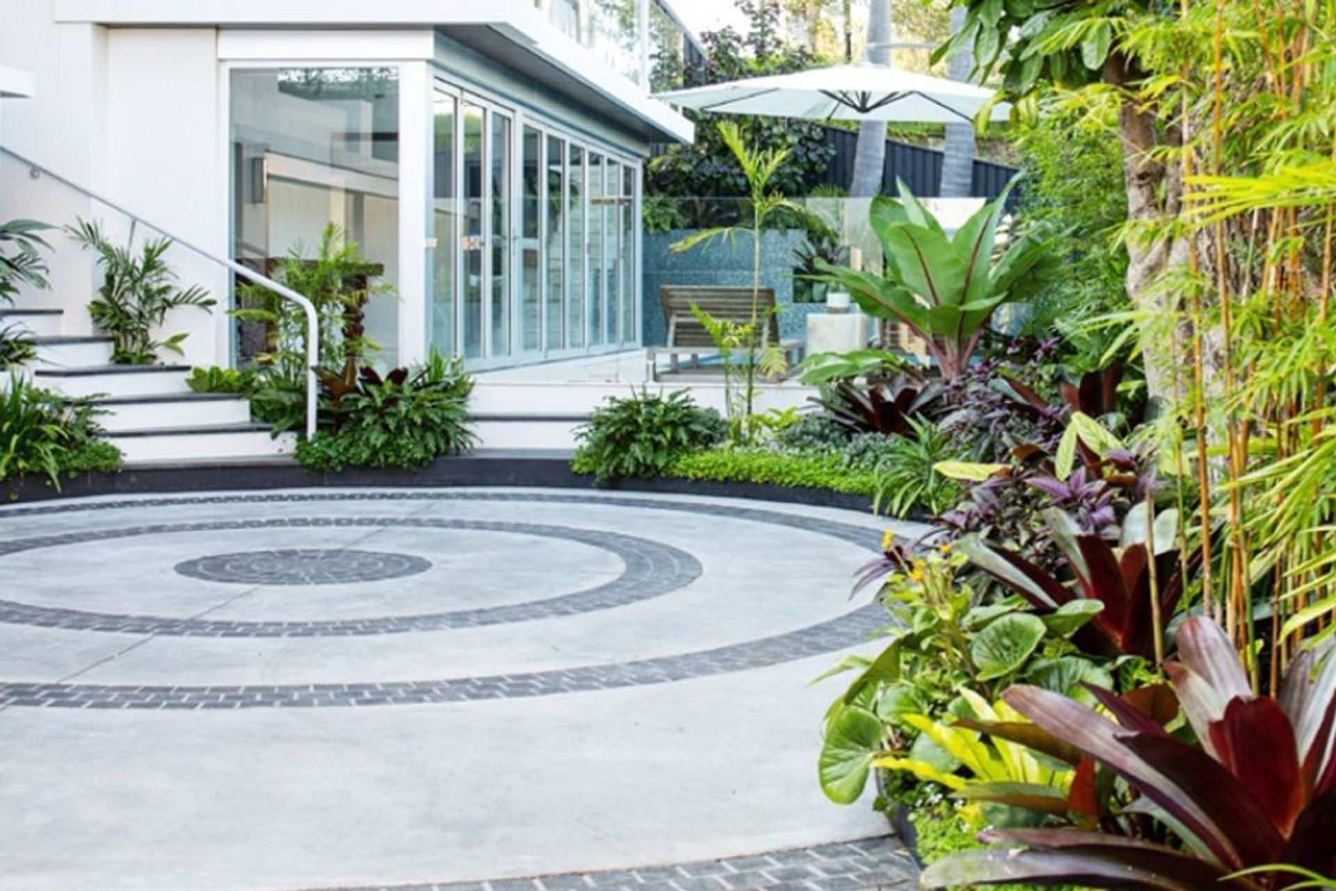 Charcoal Grey Granite Cobblestones | Landsberg Gardens | Quercus Gardens | Tasman Building | Annie Benjamin Design