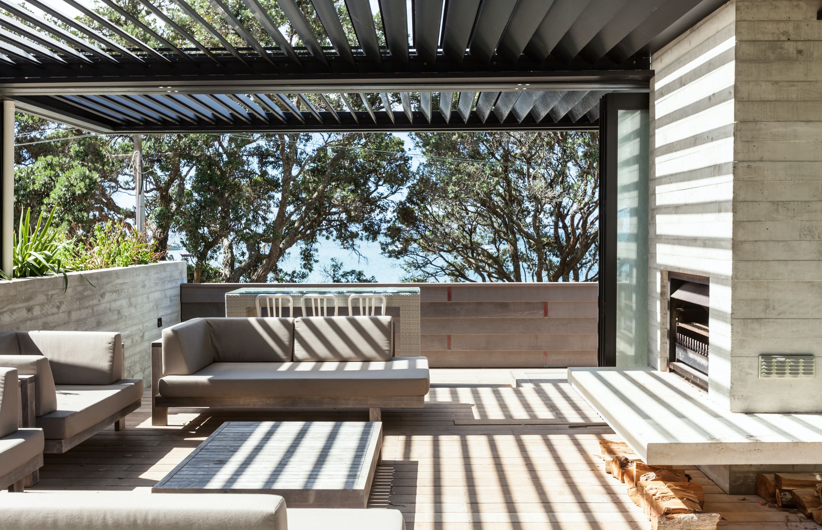 In this double bay setup, the blades run parallel to the house allowing maximum light/sun into the adjacent living room