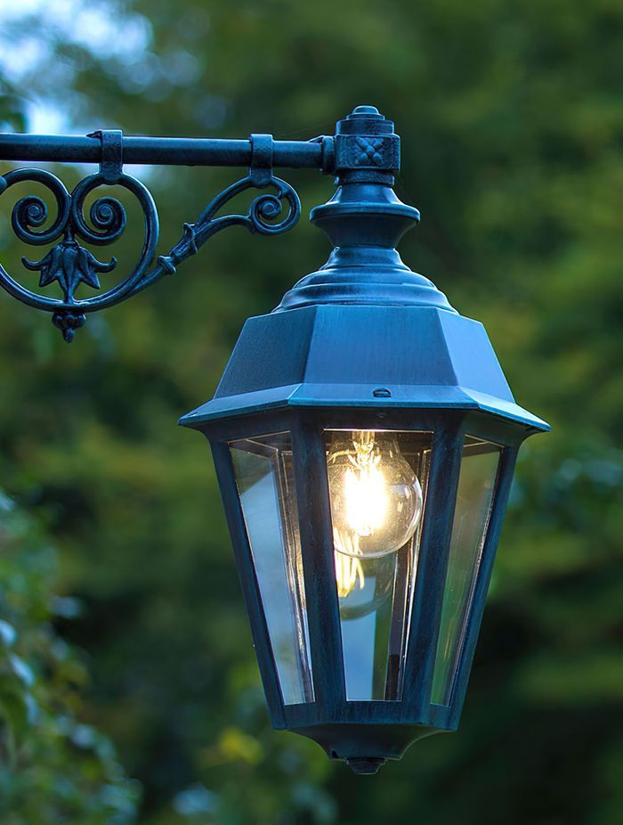 You can use forms of outdoor lighting for different areas of your home's facade.