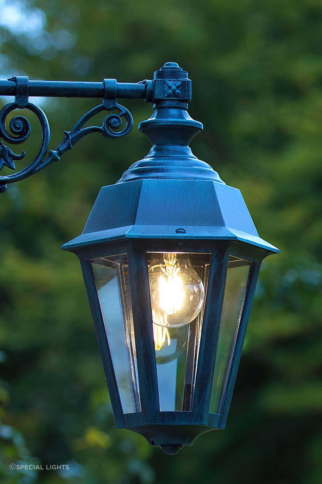 You can use forms of outdoor lighting for different areas of your home's facade.