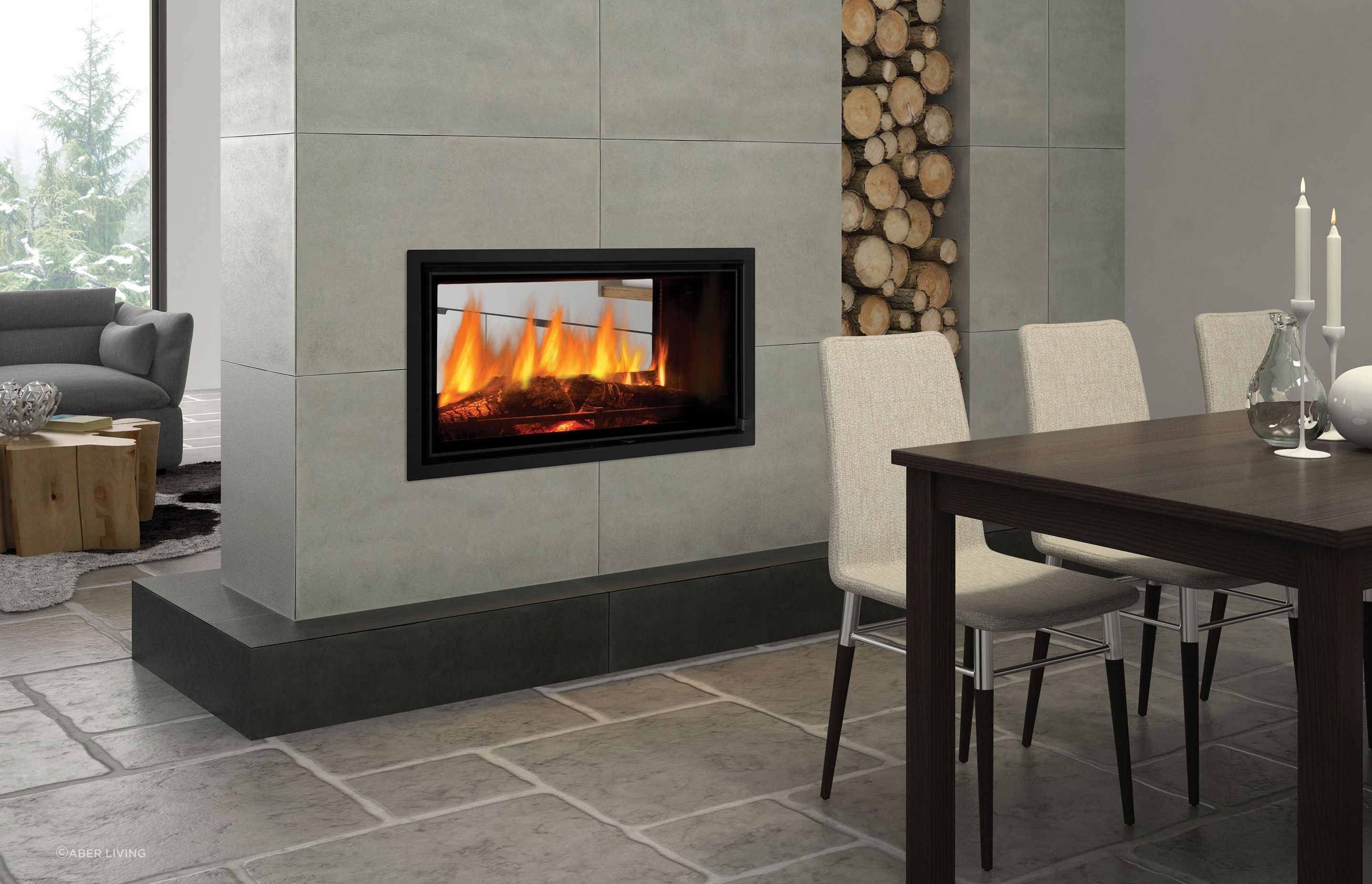 A see through fireplace is an elegant way to divide two spaces while retaining some feeling of openness.