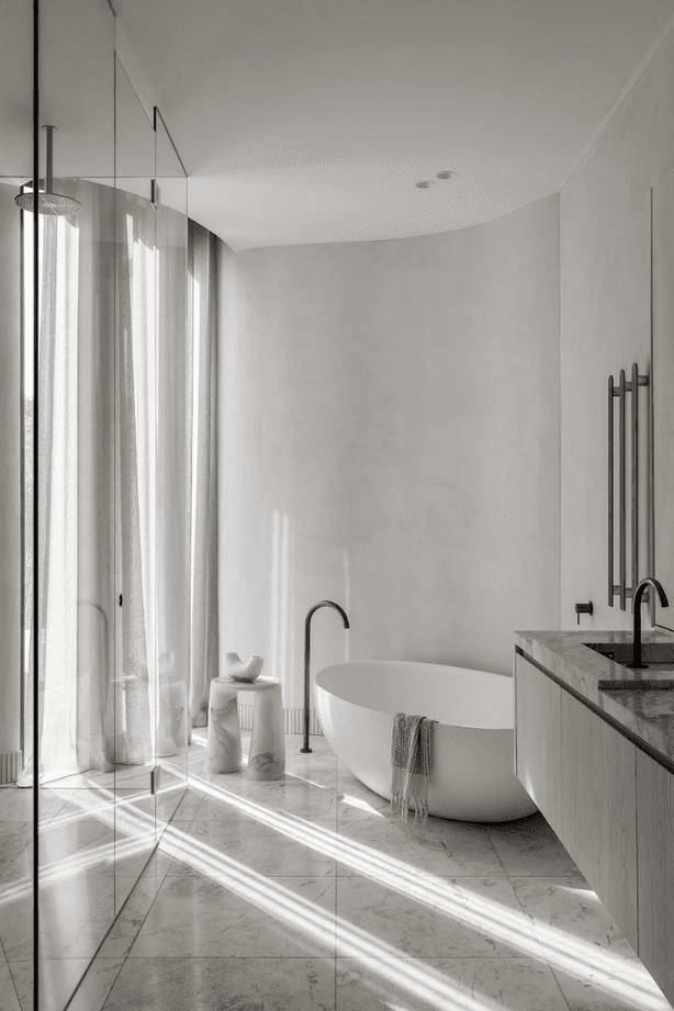 Opulent materials that are both striking and balanced in the way they sit in various rooms are featured in the space.
