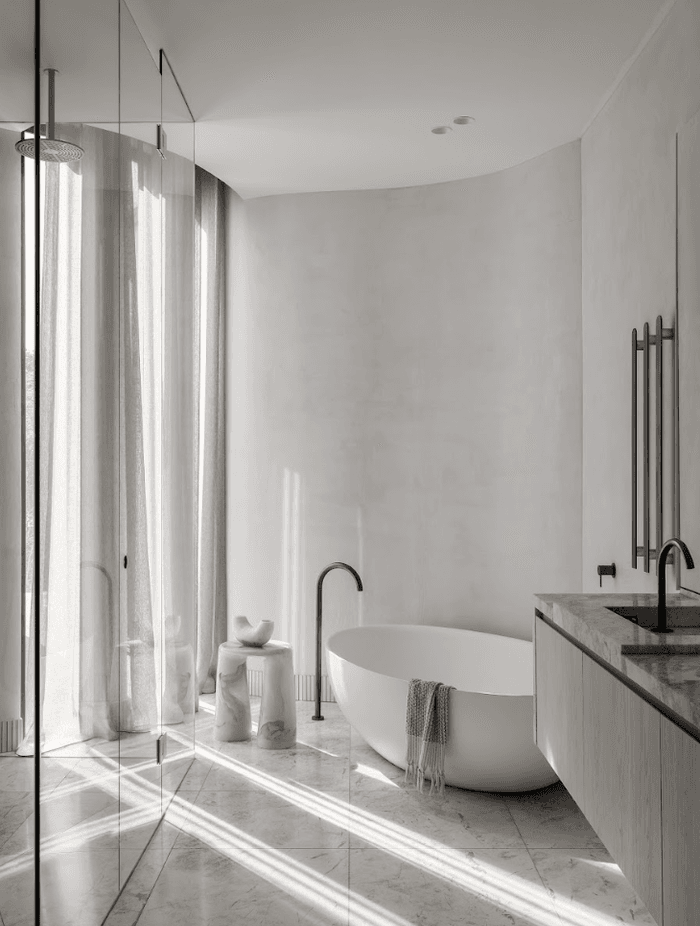 Opulent materials that are both striking and balanced in the way they sit in various rooms are featured in the space.