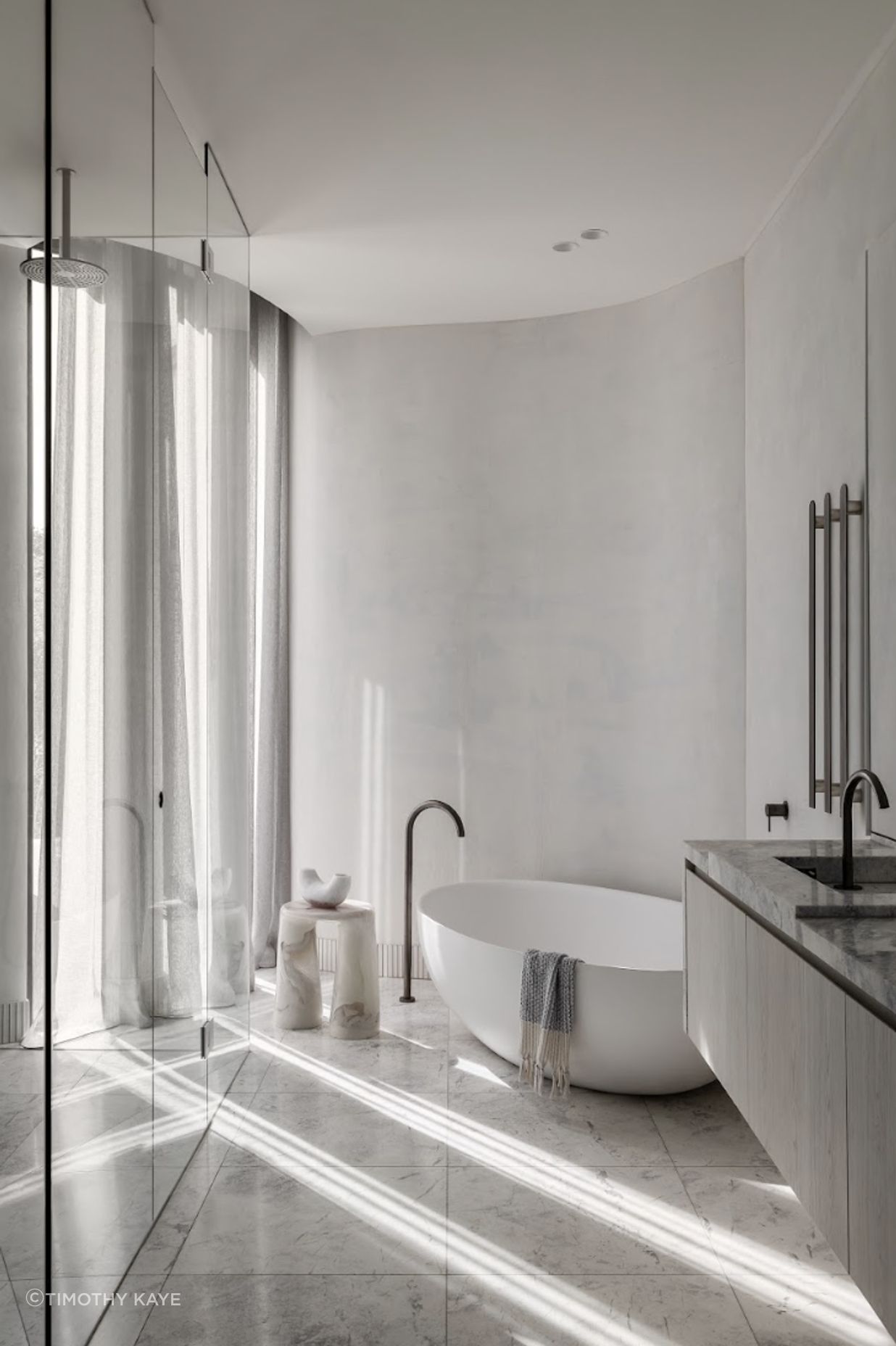 Opulent materials that are both striking and balanced in the way they sit in various rooms are featured in the space.