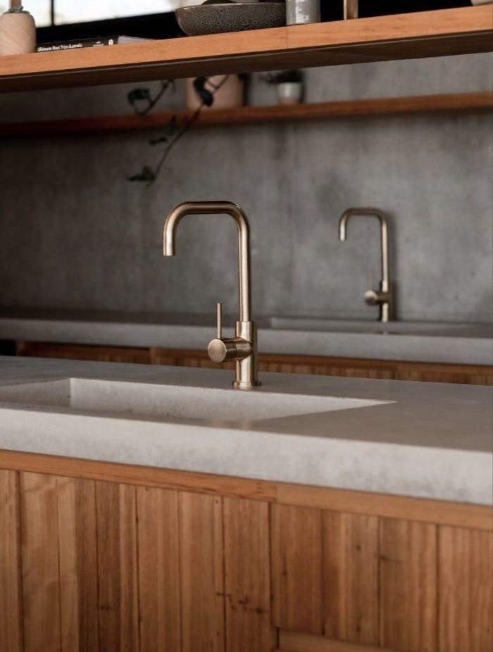 Modern kitchen mixer taps, allow for precise temperature control by blending hot and cold water sources.