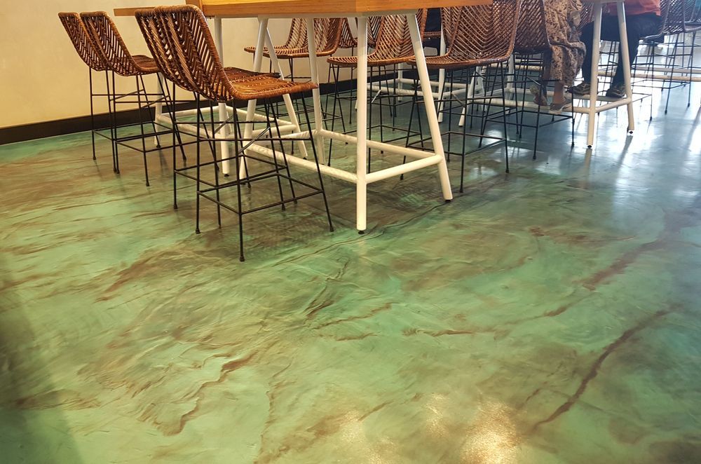 The Micro-colour finish was teamed with a metallic epoxy floor coating to create a truly unique interior.