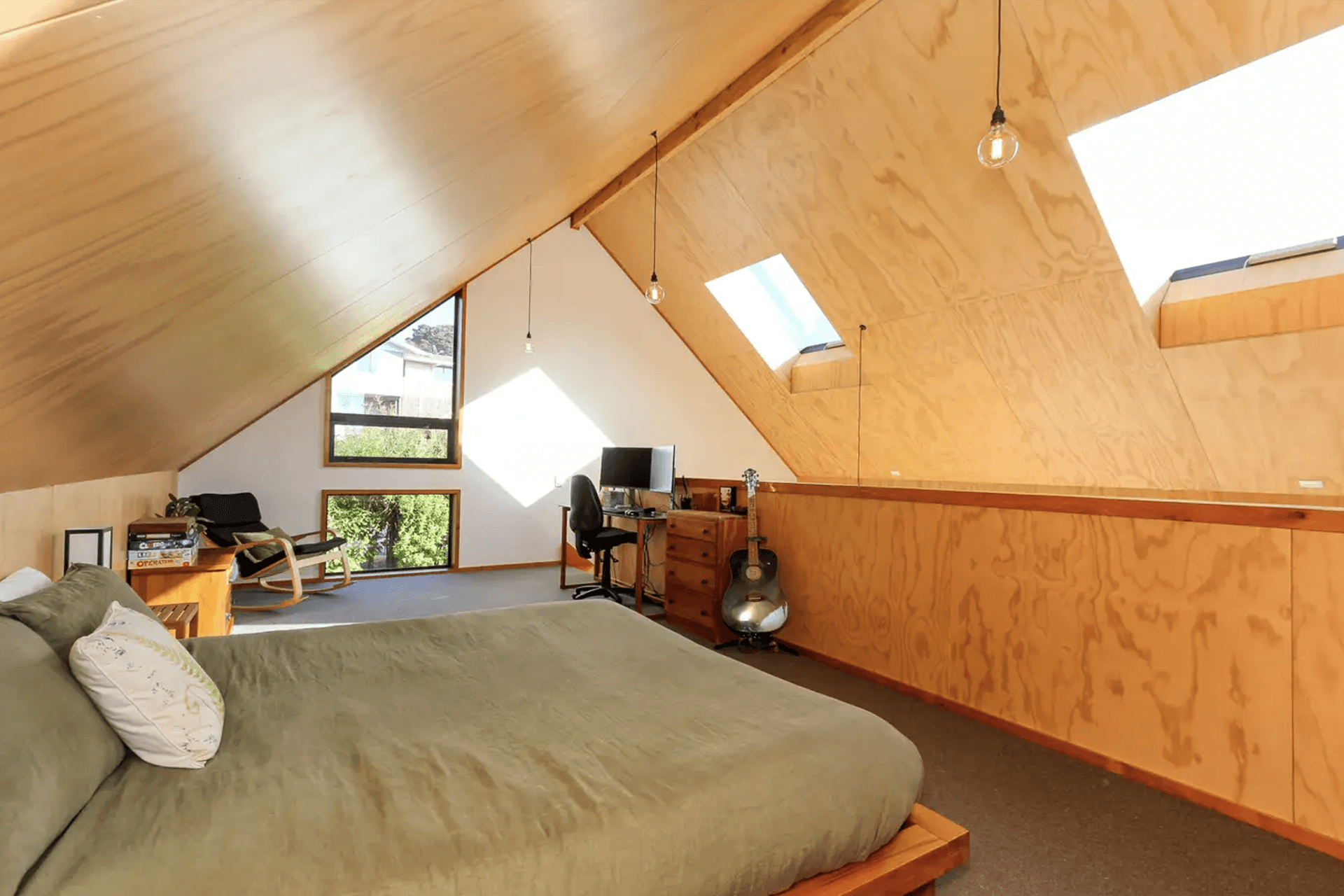 The mezzanine can function as a bedroom, office, or second living space depending on the owners needs.