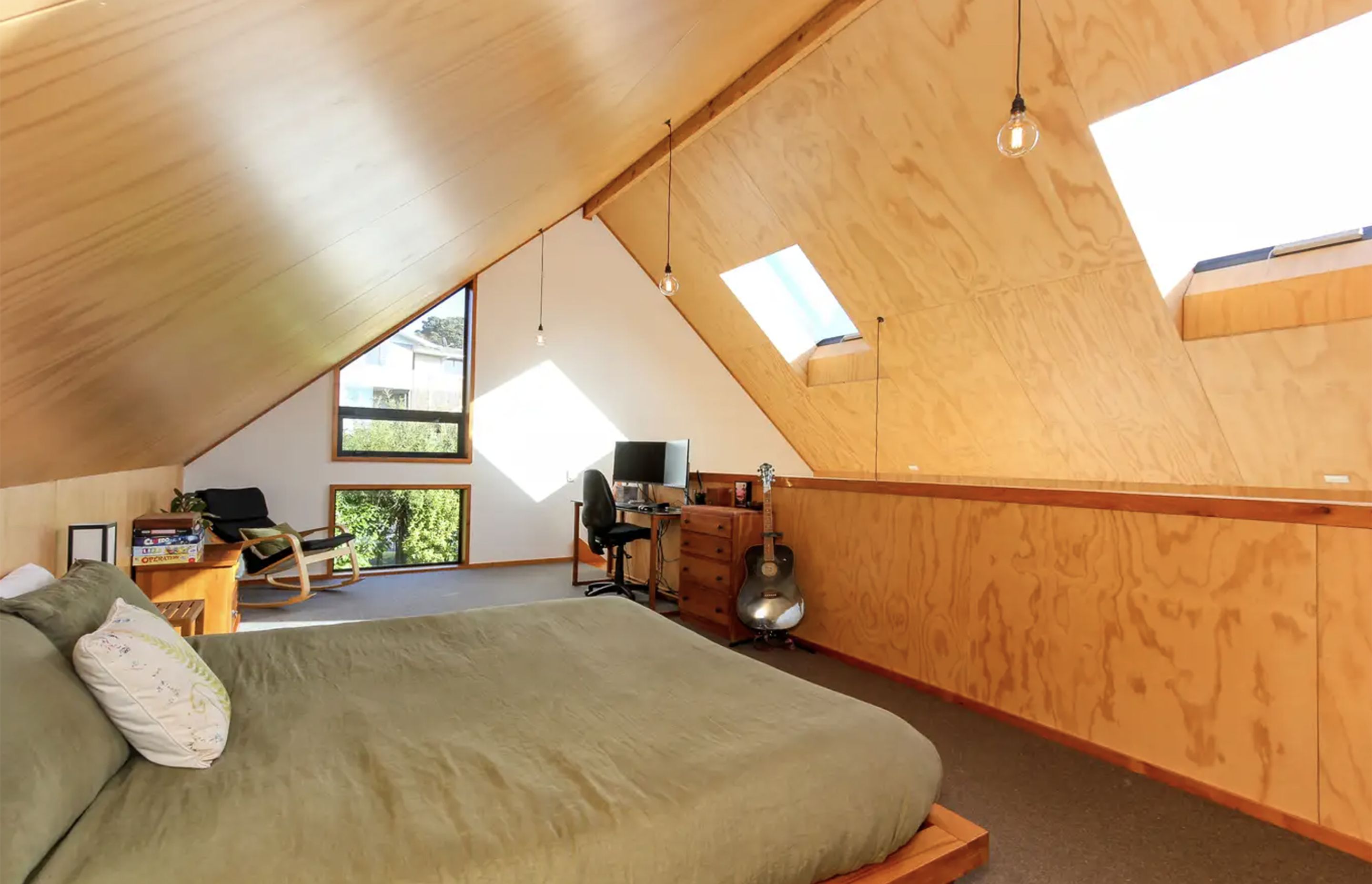The mezzanine can function as a bedroom, office, or second living space depending on the owners needs.