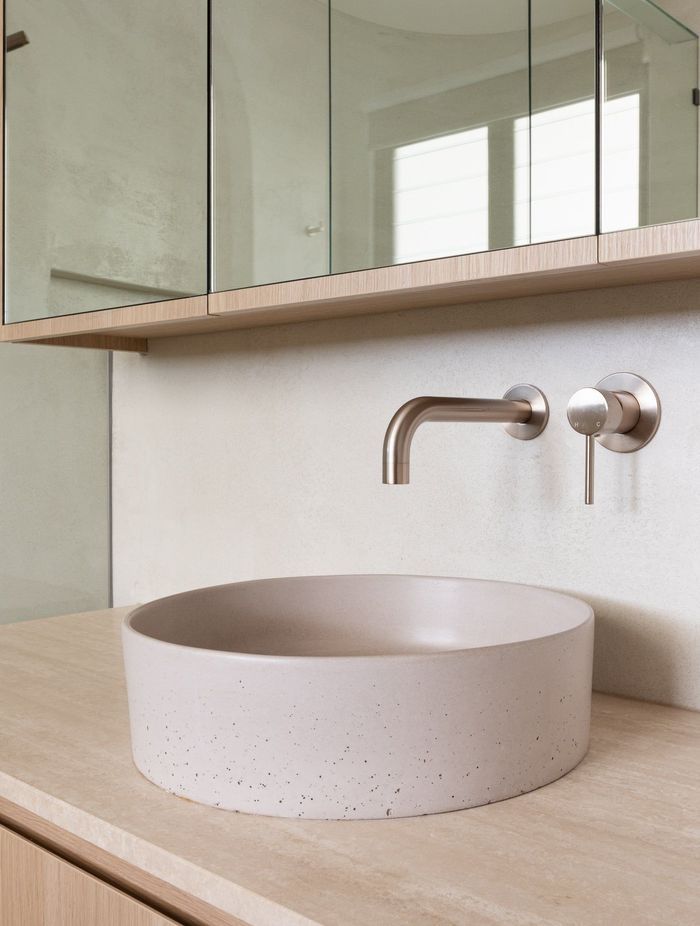 Wall-mounted taps fixed directly to the wall offer more space around the basin.