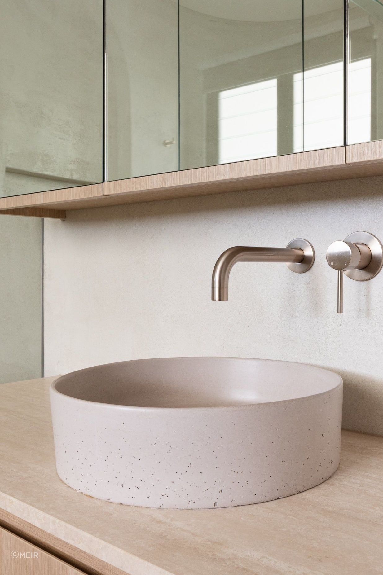 Wall-mounted taps fixed directly to the wall offer more space around the basin.