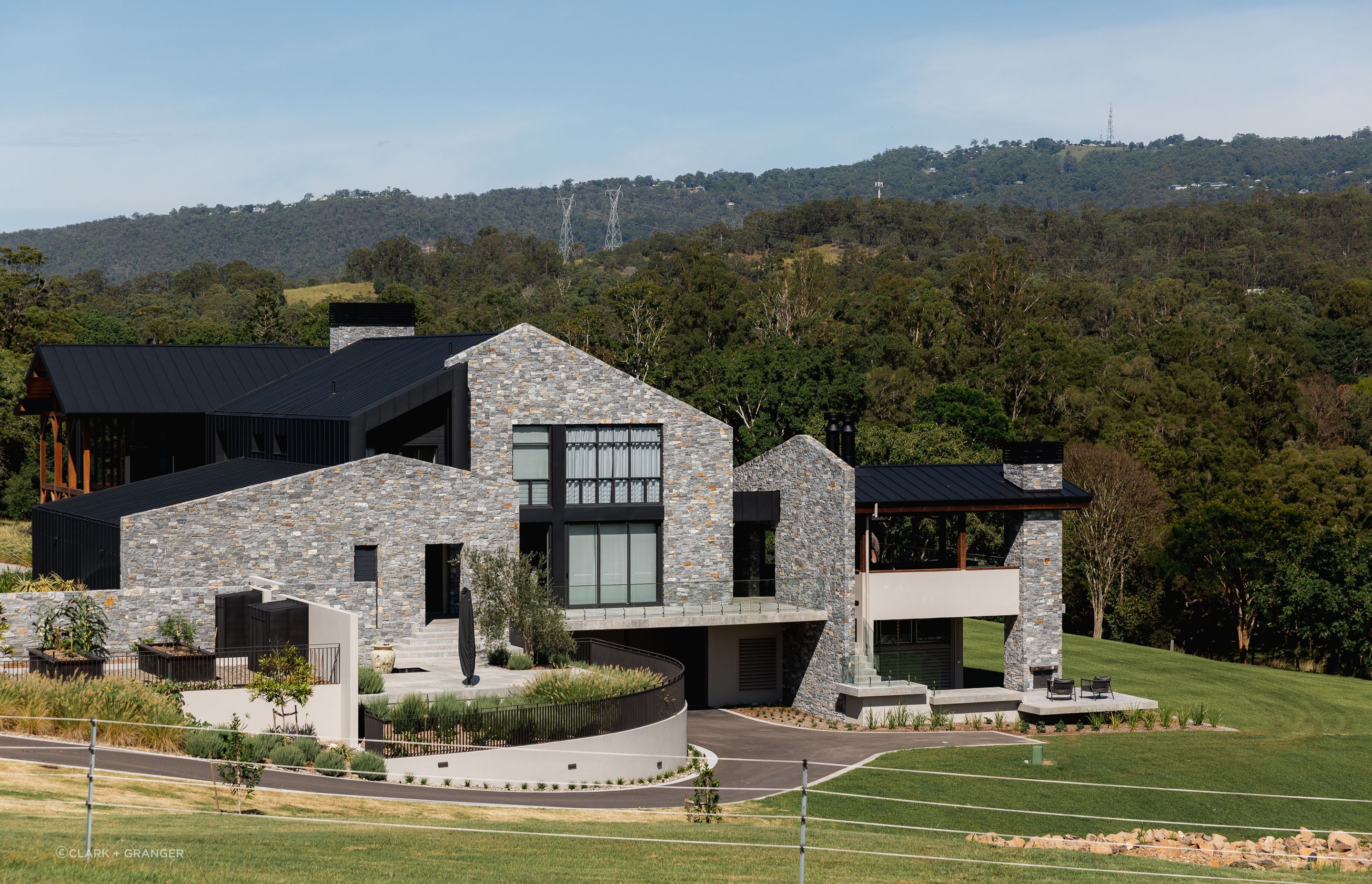 A truly stunning property, nestled gracefully into the hillside. Photographer: Sabine Bannard.