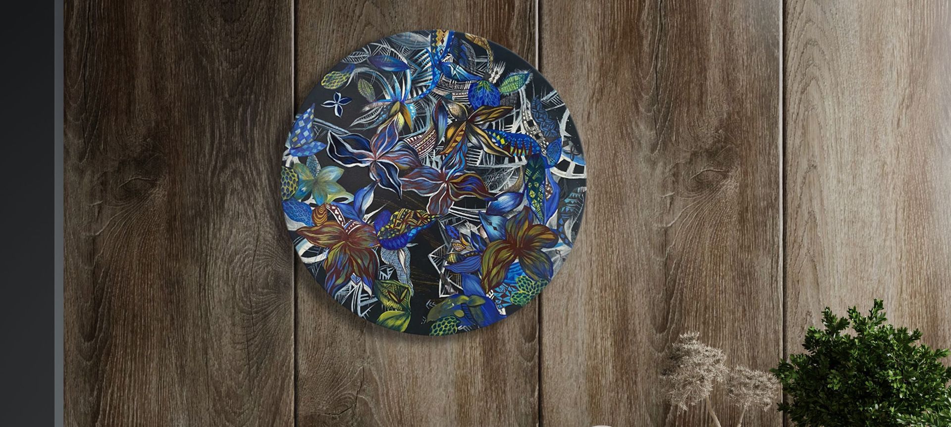 NEPUTINA blends flora designs with Samoan Tatau symbols, using moody blue tones and inspired by Neptune's energies. The painting is on round canvas board using acrylic and ink.