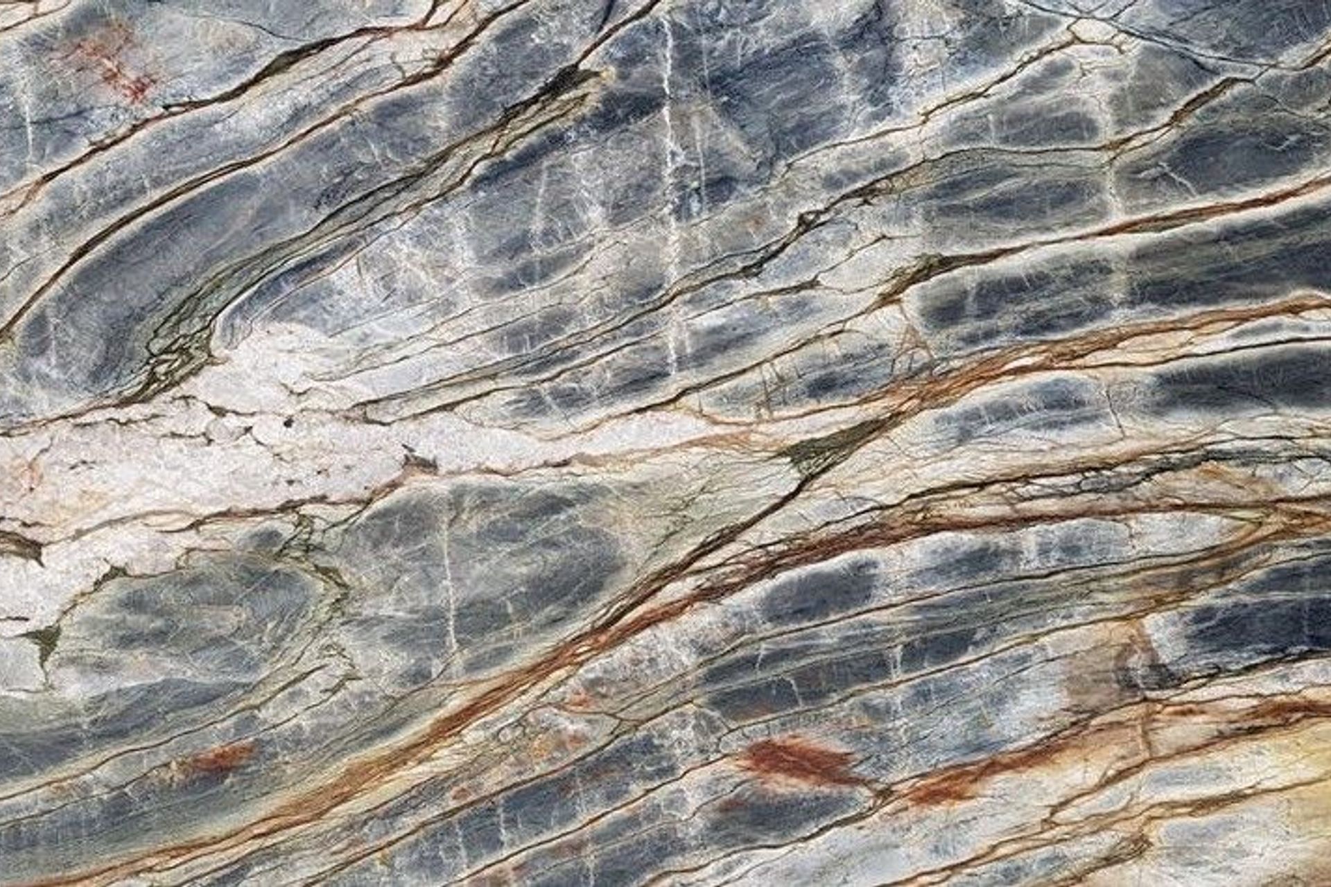 Hayley incorporated Universal Granite's Blue Tempest natural quartzite in her materials board, for its richly layered tones.
