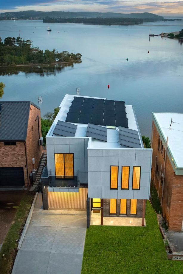 Newcastle-Building-Custom-sectional-door-cladded-in-DecoWood-Marks-Point-Lake-Macquarie-2.jpg
