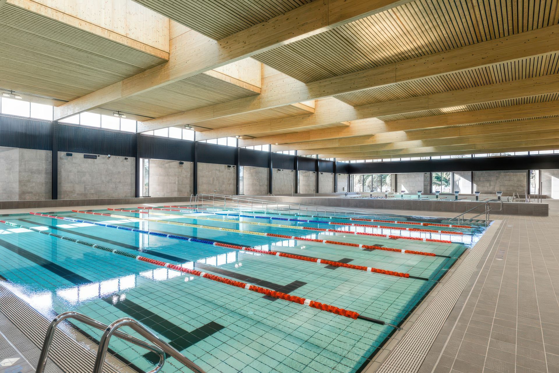 Northcote Aquatic Recreation Centre: Architect Warren &amp; Mahoney chose Agrob Buchtal Hytect tiles throughout the facility including Area Pro series on the pool hall concourse.