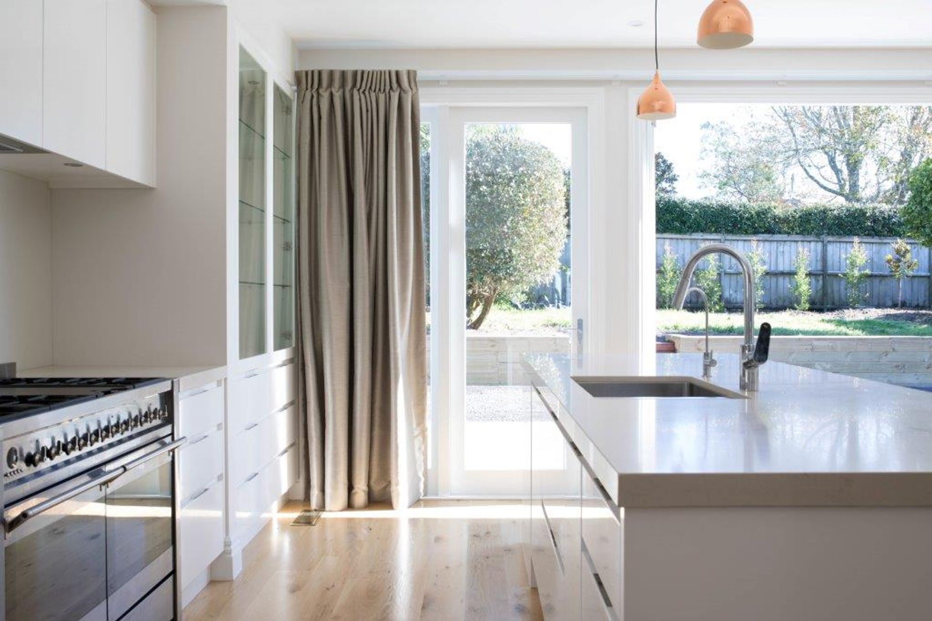 The new kitchen looks out into an open-plan living space, which is ideal for entertaining.